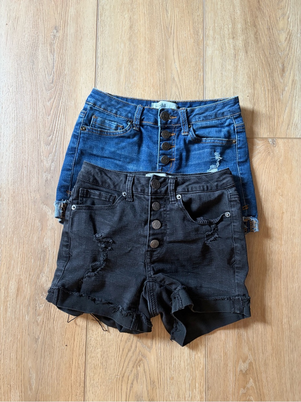 Blue and Black Button-Front Distressed Jean Shorts